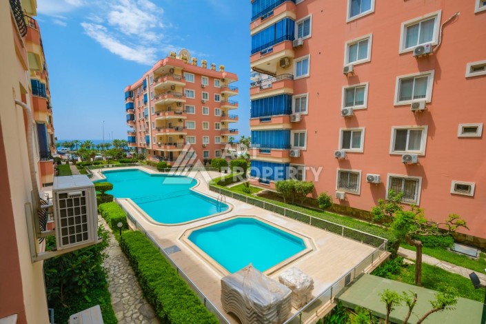 Квартира 2+1 с видом на море в Махмутларе, 105 кв.м. - Ракурс 1