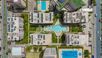 Квартира 2+1 с видом на море в Махмутларе, 105 кв.м. - Ракурс 23