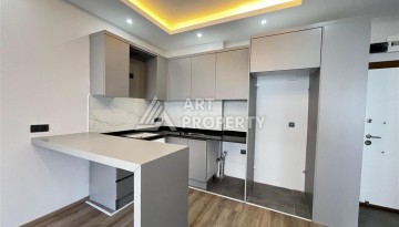 Квартира 1+1 с приватным садом в Авсалларе, 50 кв.м. - Ракурс 2