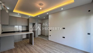 Квартира 1+1 с приватным садом в Авсалларе, 50 кв.м. - Ракурс 3