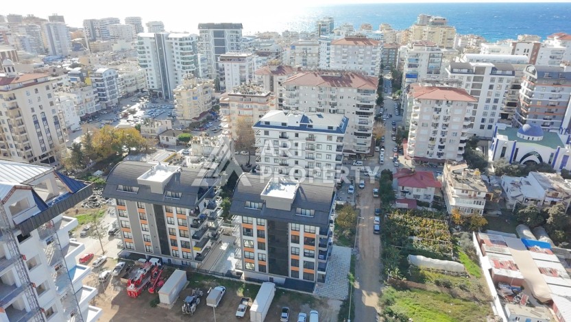 Квартира 1+1 в центре Махмутлара — 500 м до моря - Ракурс 0