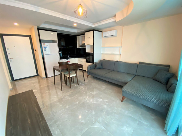 Меблированная двухкомнатная квартира  в Махмутларе, 75 м2 - Ракурс 3