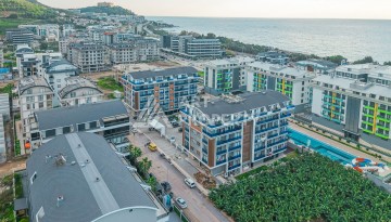 Двухуровневая квартира 3+1 в элитном районе Каргыджак, 200 метров до моря - Ракурс 36