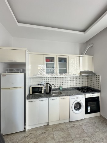 Уютная квартира 1+1 в Махмутларе, 60 кв.м. - Ракурс 2
