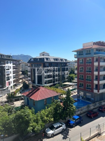 Квартира 1+1 в центре Алании, 55 кв.м. Вид на крепость. - Ракурс 14