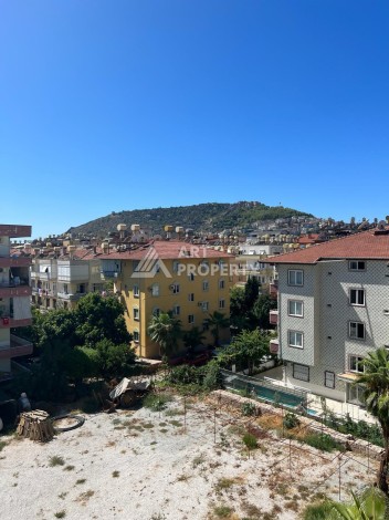 Квартира 1+1 в центре Алании, 55 кв.м. Вид на крепость. - Ракурс 15