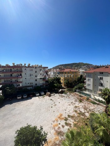 Квартира 1+1 в центре Алании, 55 кв.м. Вид на крепость. - Ракурс 16