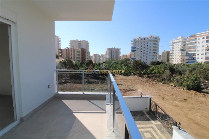 Двухкомнатная квартира в новом комплексе в районе Махмутлар, 56 м2 - Ракурс 13