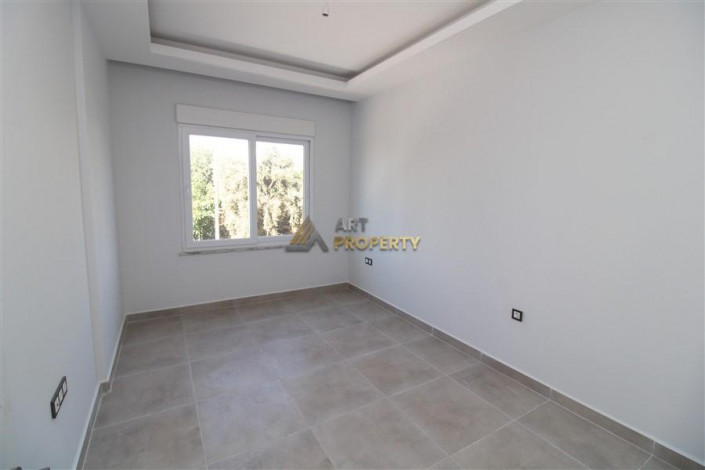 Двухкомнатная квартира в новом комплексе в районе Махмутлар, 56 м2 - Ракурс 19