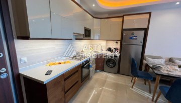 Квартира 1+1 в премиальной резиденции Махмутлара, 70 кв.м. - Ракурс 6