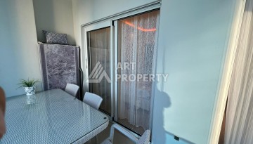 Квартира 1+1 в премиальной резиденции Махмутлара, 70 кв.м. - Ракурс 14