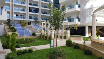 Квартира 1+1 в премиальной резиденции Махмутлара, 70 кв.м. - Ракурс 18