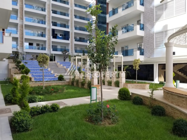 Квартира 1+1 в премиальной резиденции Махмутлара, 70 кв.м. - Ракурс 17