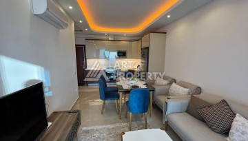 Квартира 1+1 в премиальной резиденции Махмутлара, 70 кв.м. - Ракурс 22