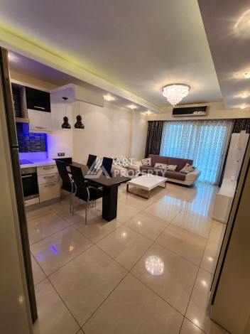 Квартира 1+1 в Махмутларе, 60 кв.м. - Ракурс 4