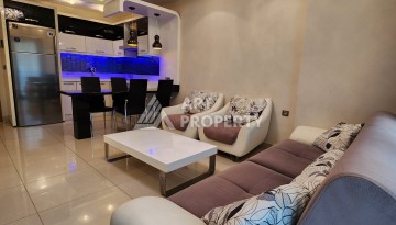 Квартира 1+1 в Махмутларе, 60 кв.м. - Ракурс 8
