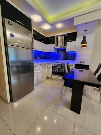 Квартира 1+1 в Махмутларе, 60 кв.м. - Ракурс 8