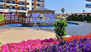 Квартира 1+1 в Махмутларе, 60 кв.м. - Ракурс 35