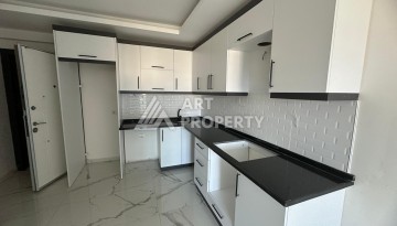Квартира 1+1 в Махмутларе с видом на горы, 58 кв.м. - Ракурс 4
