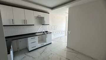 Квартира 1+1 в Махмутларе с видом на горы, 58 кв.м. - Ракурс 5