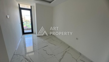 Квартира 1+1 в Махмутларе с видом на горы, 58 кв.м. - Ракурс 8