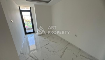 Квартира 1+1 в Махмутларе с видом на горы, 58 кв.м. - Ракурс 10