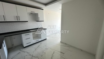 Квартира 1+1 в Махмутларе с видом на горы, 58 кв.м. - Ракурс 11