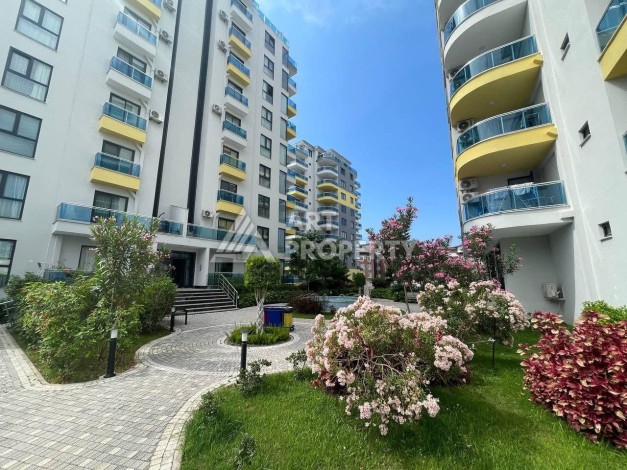 Квартира 1+1 в Махмутларе с видом на горы, 58 кв.м. - Ракурс 11