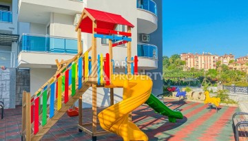 Квартира 1+1 в Махмутларе с видом на горы, 58 кв.м. - Ракурс 14