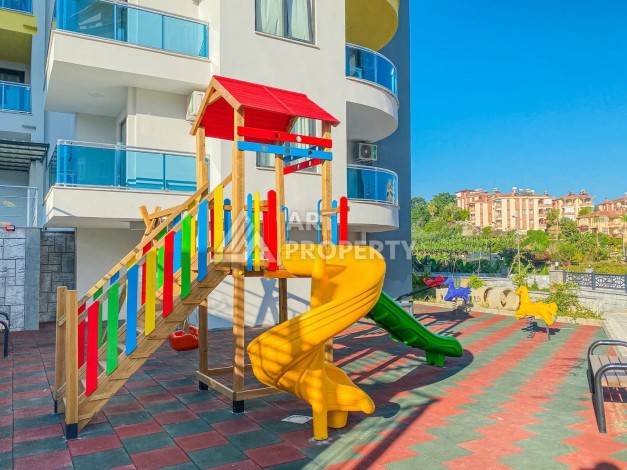 Квартира 1+1 в Махмутларе с видом на горы, 58 кв.м. - Ракурс 13