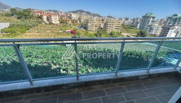 Квартира 1+1 в Махмутларе с видом на горы, 58 кв.м. - Ракурс 18