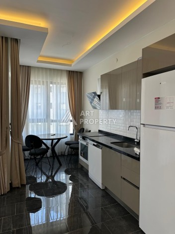 Меблированная квартира 1+1 в центре Махмутлара, 50 кв.м. - Ракурс 3