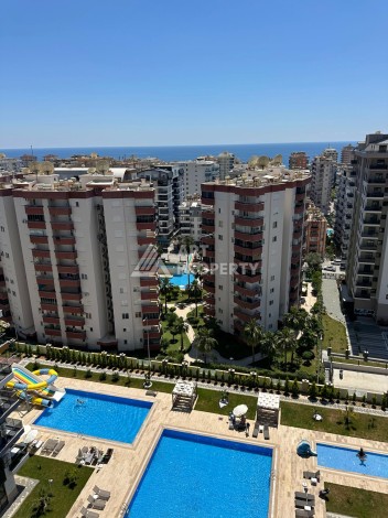 Квартира 1+1 с видом на море, 50 кв.м. Махмутлар, Алания - Ракурс 14