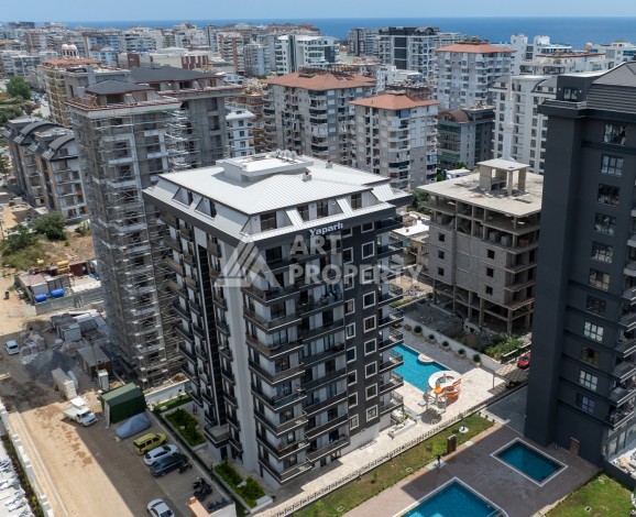 Квартира 1+1 в центре Махмутлара, 55 кв.м. Срочная продажа - Ракурс 1