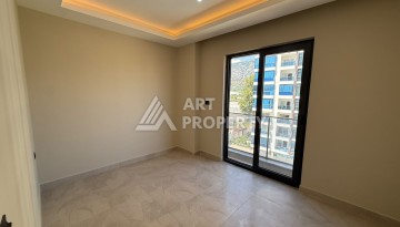 Квартира 1+1 в центре Махмутлара, 55 кв.м. Срочная продажа - Ракурс 3