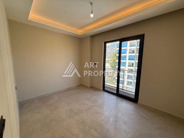 Квартира 1+1 в центре Махмутлара, 55 кв.м. Срочная продажа - Ракурс 2