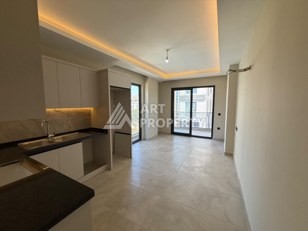 Квартира 1+1 в центре Махмутлара, 55 кв.м. Срочная продажа - Ракурс 6