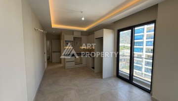 Квартира 1+1 в центре Махмутлара, 55 кв.м. Срочная продажа - Ракурс 8