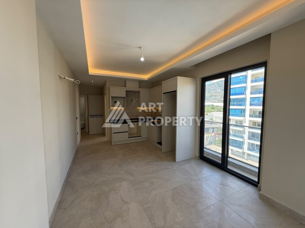 Квартира 1+1 в центре Махмутлара, 55 кв.м. Срочная продажа - Ракурс 7