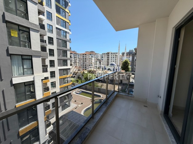 Квартира 1+1 в центре Махмутлара, 55 кв.м. Срочная продажа - Ракурс 9