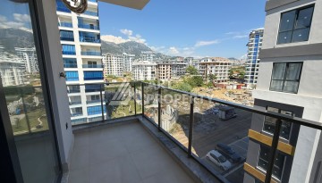 Квартира 1+1 в центре Махмутлара, 55 кв.м. Срочная продажа - Ракурс 11