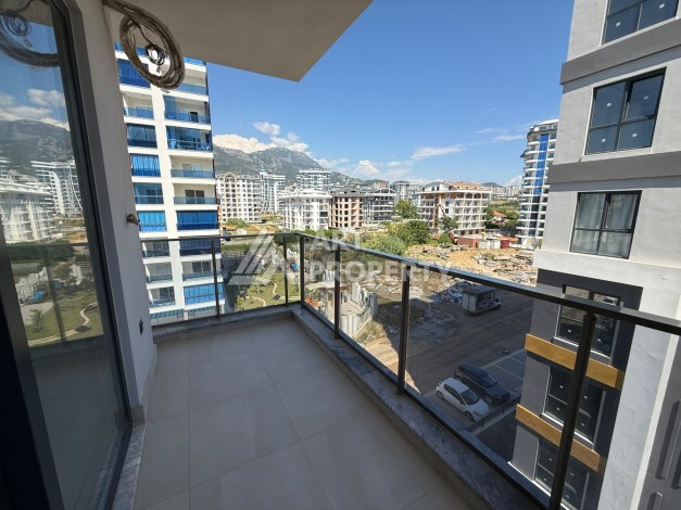 Квартира 1+1 в центре Махмутлара, 55 кв.м. Срочная продажа - Ракурс 10
