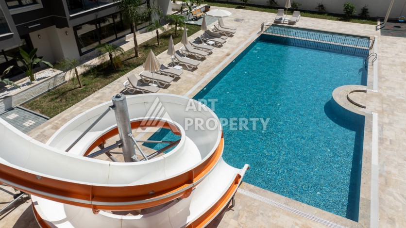Квартира 1+1 в центре Махмутлара, 55 кв.м. Срочная продажа - Ракурс 16