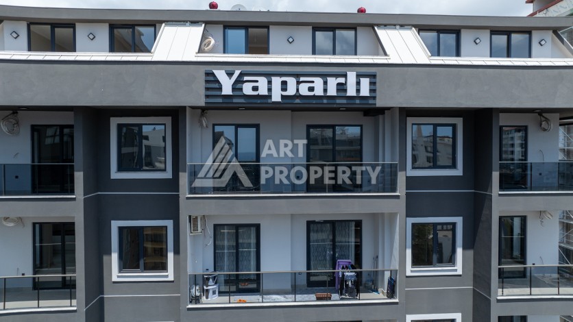 Квартира 1+1 в центре Махмутлара, 55 кв.м. Срочная продажа - Ракурс 18