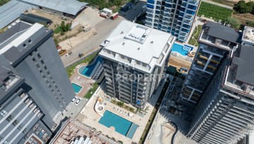 Квартира 1+1 в центре Махмутлара, 55 кв.м. Срочная продажа - Ракурс 36