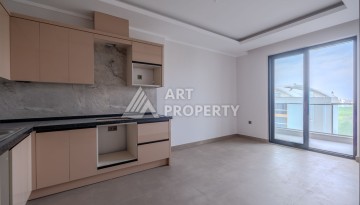 Квартира 1+1 в новом ЖК, 55 кв.м. Махмутлар, Алания - Ракурс 2