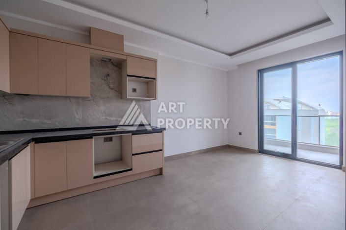 Квартира 1+1 в новом ЖК, 55 кв.м. Махмутлар, Алания - Ракурс 1