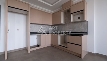 Квартира 1+1 в новом ЖК, 55 кв.м. Махмутлар, Алания - Ракурс 4