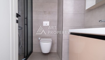 Квартира 1+1 в новом ЖК, 55 кв.м. Махмутлар, Алания - Ракурс 7