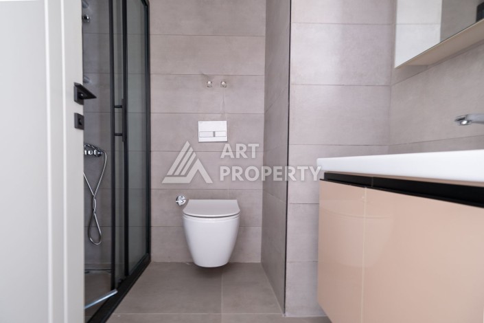 Квартира 1+1 в новом ЖК, 55 кв.м. Махмутлар, Алания - Ракурс 6